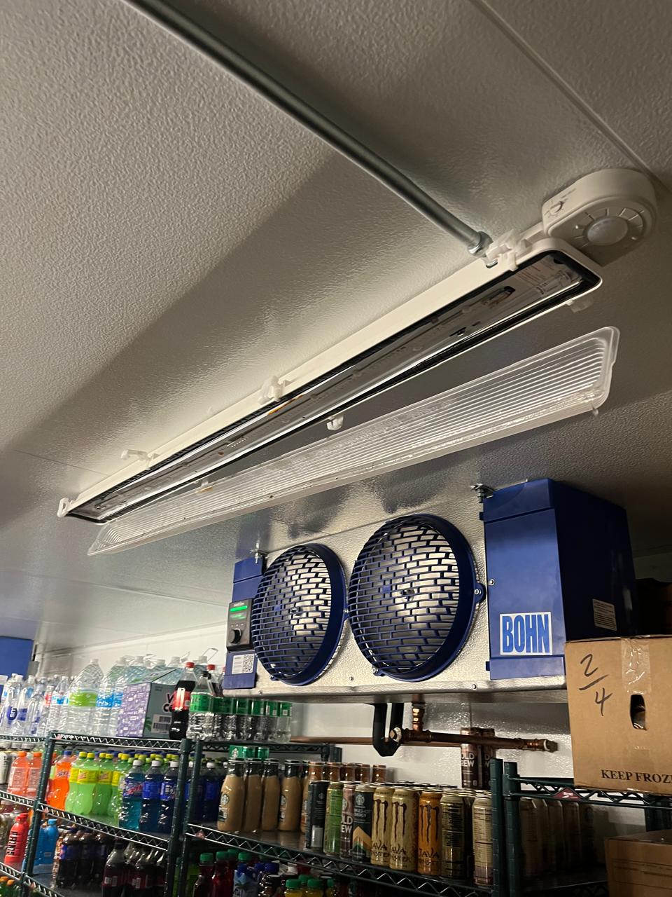 Commercial ceiling light before repair